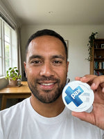 Wiremu P from Rotorua holding a PAX Cool Mint tin